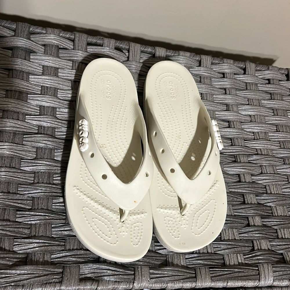 Croc platform flip flops color bone size 9, only worn around my yard a few times